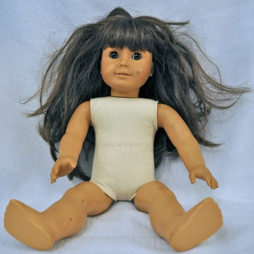 broken american girl doll